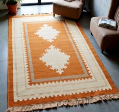 Hand Knotted Orange And Southwestern Wool Rug